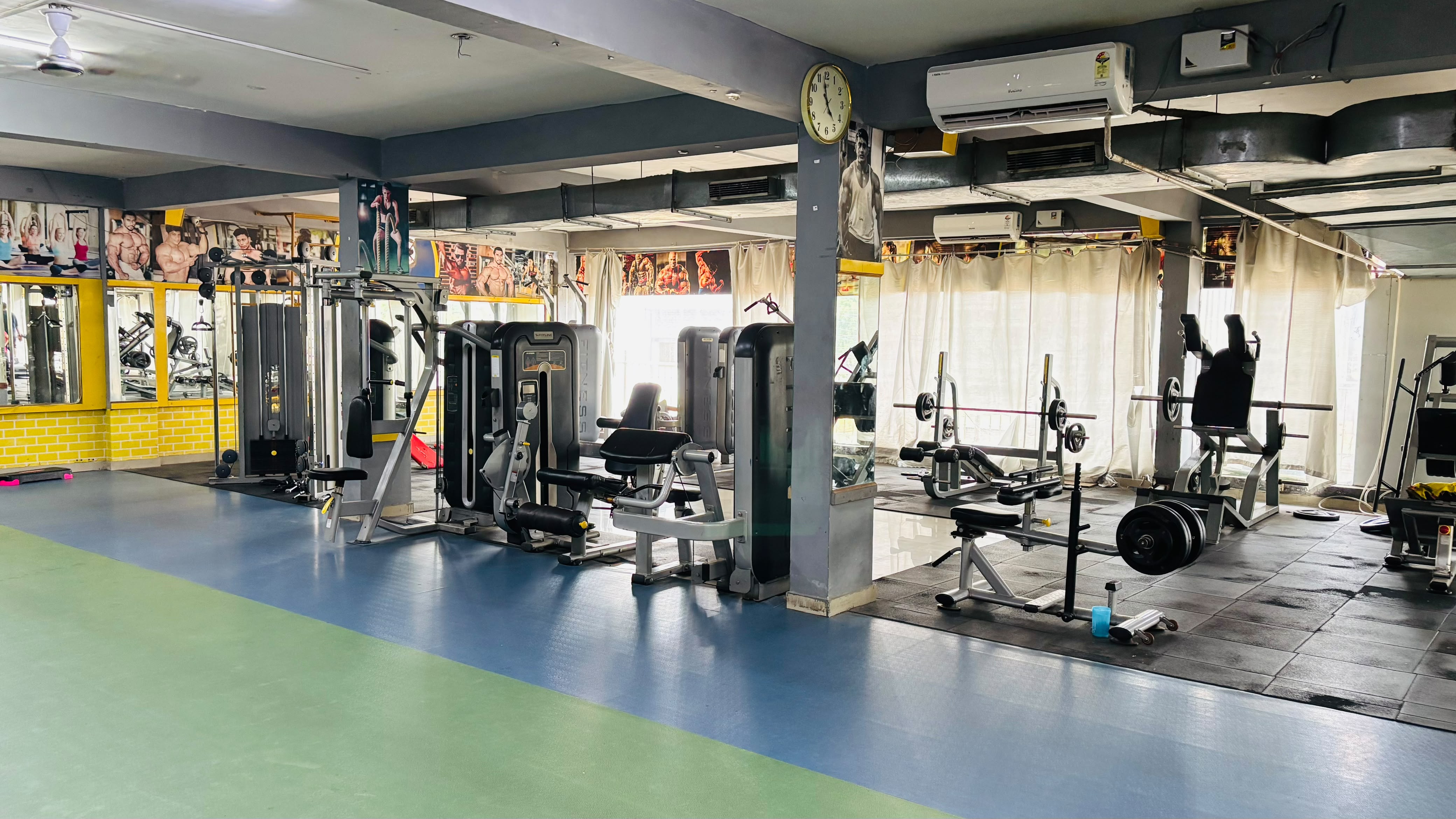 Main gym training floor with strength equipment and open workout space.